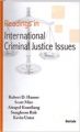 Reading in International Criminal Justice Issues: Book by Robert D. Hanser Et Al.